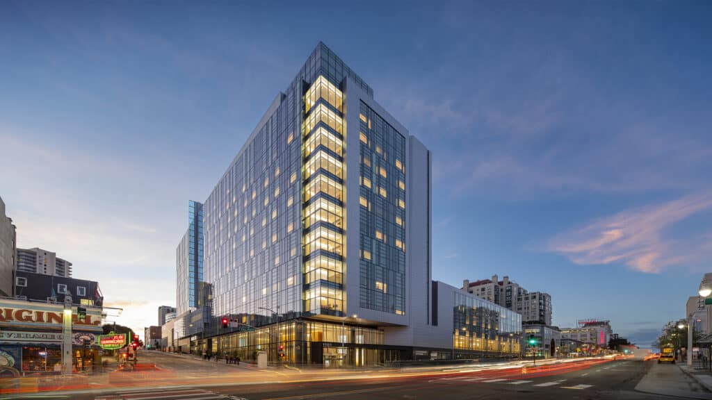 Sutter Health CPMC Van Ness Campus Hospital Exterior View of Building, Lit at Dusk