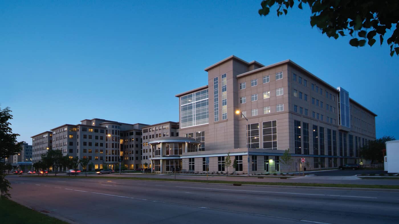 University of Wisconsin - Madison - Newell Smith Residence Hall Exterior View of Building from across Street, Lit at Dusk