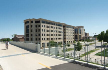 University of Wisconsin - Madison - Newell Smith Residence Hall Exterior View of Building from Bike Path, with Street Below Visible