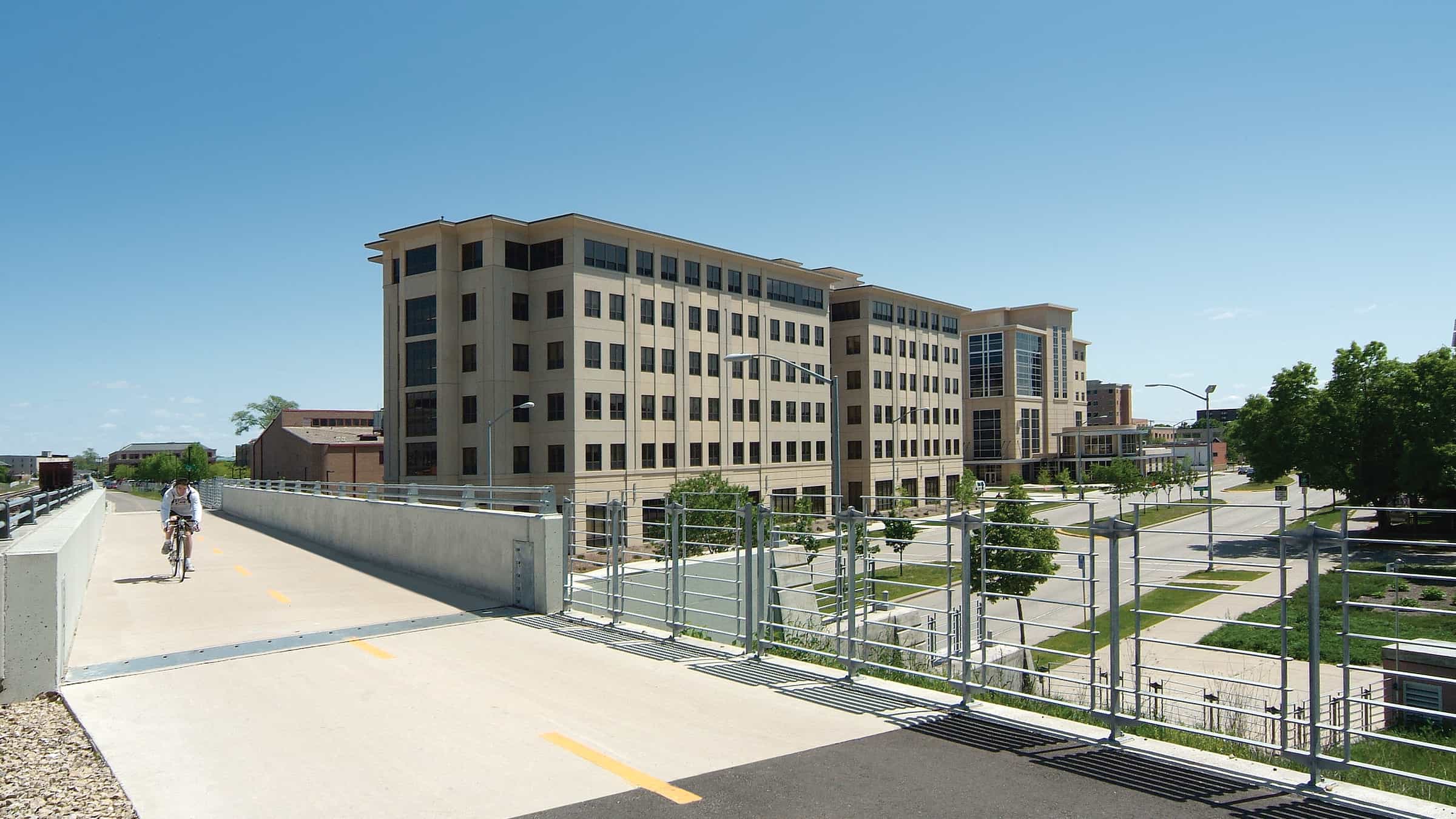 University of Wisconsin - Madison - Newell Smith Residence Hall Exterior View of Building from Bike Path, with Street Below Visible