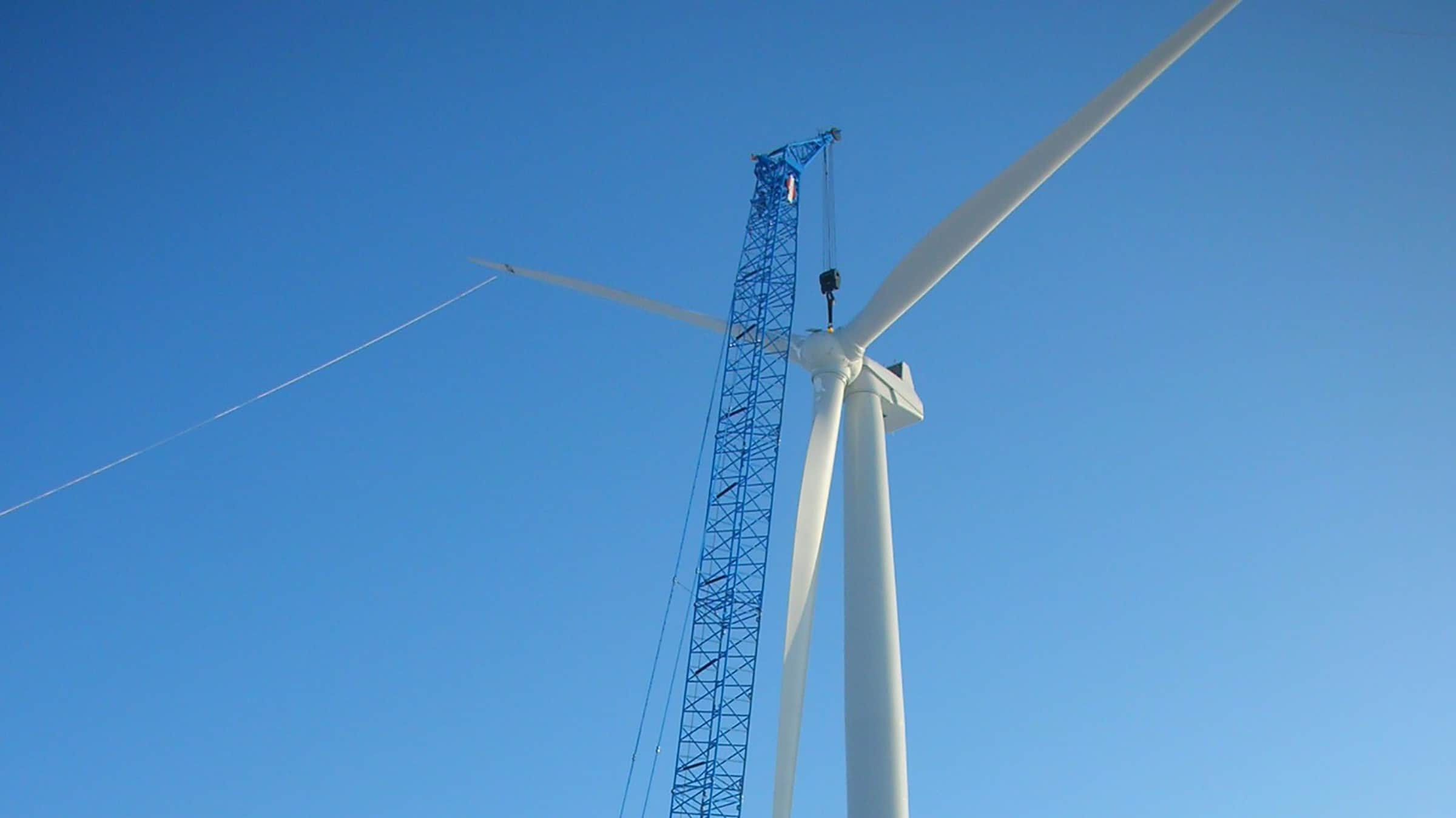 WE Energies - Wind Turbine Erection - Crane Lifts Blades onto Tower